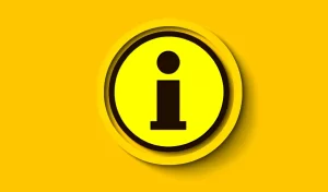 black information sign in a circle on a yellow background